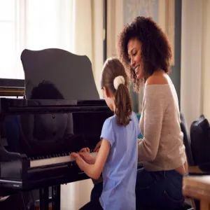Piano/organ music classes home visit by lady teacher
